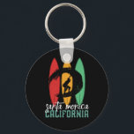 Santa Monica Beach California Retro Surfing Key Ring<br><div class="desc">Vintage retro surfboard design for surfers who love surfing and riding the ocean waves. Cool summer holiday, spring break merchandise for those who enjoy hot sun, tropical weather, sunbathing under the palm tree. Grunge and distressed design to wear while enjoying the beach party and singing around the bonfire. Great souvenir,...</div>