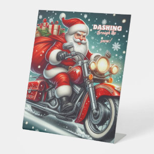 Santa on a motorcycle pedestal sign