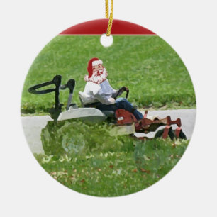 Santa on a riding lawn mower  landscaper ceramic tree decoration