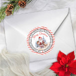 Santa | Reindeer Christmas Circle Return Address Classic Round Sticker<br><div class="desc">Cute watercolor santa and reindeer "Merry Christmas" circular return address envelope or package seal.  Design features a red and white diagonal-striped background on the outside rims of the circle as a backdrop to snowfall. Simply personalise with your greeting,  name or family name and return address,  city,  state and zip.</div>