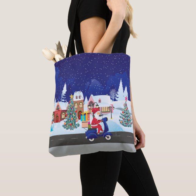 Santa ride scooter in the night town tote bag (Close Up)