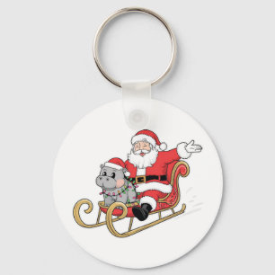 Santa Riding Sleigh with a Moo Deng Baby Hippo Key Ring