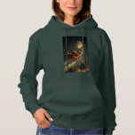Santa’s Moonlit Christmas Ride Hoodie<br><div class="desc">Bring the holiday spirit to life with this enchanting Christmas design featuring Santa Claus riding his sleigh under the glowing full moon, guided by reindeer across a snowy winter night. Perfect for Christmas cards, holiday gifts, New Year celebrations, festive décor, Santa sleigh art, winter wonderland illustrations, Xmas decorations, and seasonal...</div>