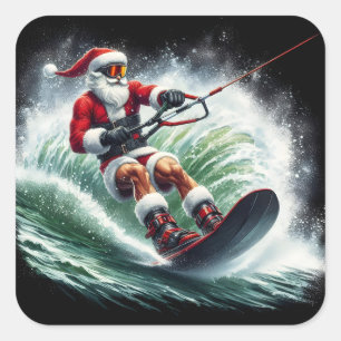 Santa Surfing at Sunset Square Sticker