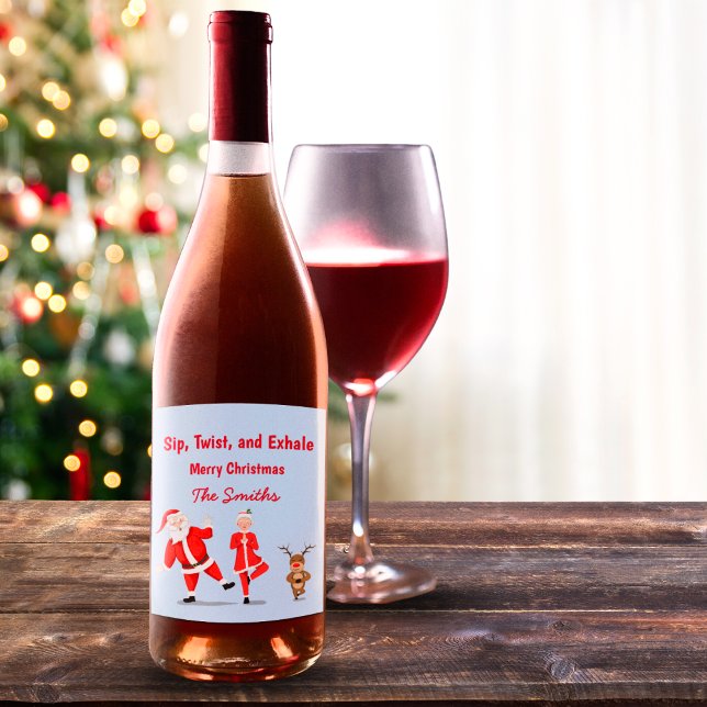 Santa Trying To Do Yoga With Mrs. Claus & Reindeer Wine Label (Celebrate the holiday season with this delightful Christmas wine bottle label, perfect for gifting.)