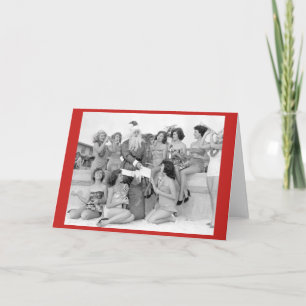 Santa with young women on beach holiday card