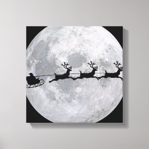 Santa's Sleigh In Front Of Moon Canvas Print
