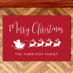 Santas Sleigh Merry Christmas Red Doormat<br><div class="desc">Festive seasonal red doormat for your Christmas holiday decor that features reindeers flying Santa's sleigh through air,  "Merry Christmas" in a modern white script and your name in simple white typography.</div>