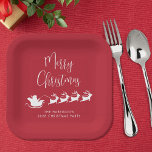 Santas Sleigh Red Christmas Party Paper Plate<br><div class="desc">Fun seasonal red and white paper plates for your Christmas holiday parties and table decor featuring a silhouette of Santa's sleigh pulled by reindeers flying through air,  "Merry Christmas" in a modern script and your name or event in simple typography.</div>