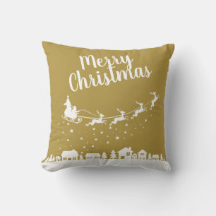 Santa's sleigh & reindeers flying above the city cushion