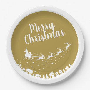 Santa's sleigh silhouette flying above the houses paper plate