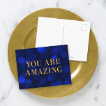 Sapphire Blue Bokeh Lights Gold You Are Amazing Postcard<br><div class="desc">Chic motivational postcard featuring the words "You Are Amazing" in faux gold foil against a sapphire blue bokeh lights pattern background. To add text to the the card click the "Customise" button. *Please note that the Zazzle Watermark that appears in the zoom preview will NOT appear on the final printed...</div>