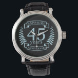Sapphire Traditional 45th wedding anniversary Watch<br><div class="desc">A design to celebrate 45 years of marriage. This design has a blue (traditional colour) coloured laurel design on a black background. Sapphire is the traditional gift for this occasion. The text reads Sapphire 25 years anniversary. A romantic design to celebrate your 25th year of marriage. If you would like...</div>