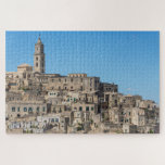 Sassi di Matera city in Italy Jigsaw Puzzle<br><div class="desc">Difficult jigsaw puzzle with the ancient architecture of the Sassi di Matera with houses cut into the mountain like caves on a clear day with a blue sky in the Basilicata region in southern Italy.</div>