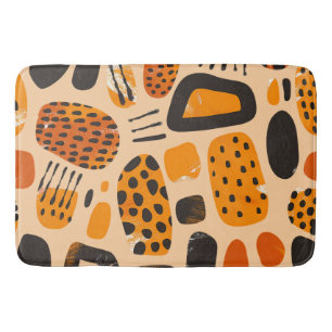"Savanna Pop: Tribal Vibes in Orange & Black" Bath Mat