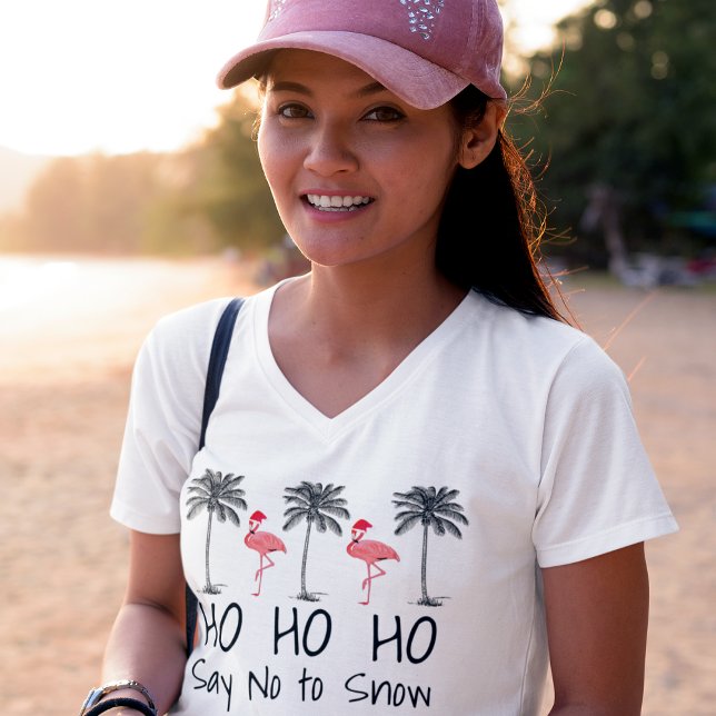 Say No to Snow Funny Beach Christmas Flamingos T-Shirt (ho ho ho say no to snow funny flamingo beach christmas t-short on female model at beach)