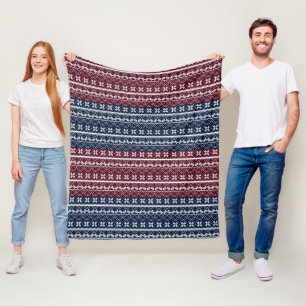 Scandinavian ornament on a blue, burgundy fleece blanket