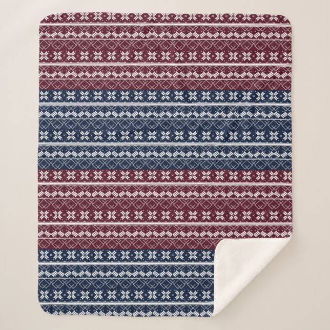 Scandinavian ornament on a blue, burgundy sherpa blanket (Front)