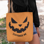 Scary Jack O Lantern Custom Orange Halloween Party Tote Bag<br><div class="desc">This spooky orange Halloween tote bag for trick or treating features a cool smiling Jack O Lantern and your own personalised text. Cute and scary custom party bags to use for trick or treat or party favours.</div>