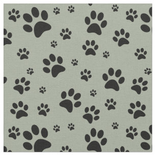Scattered Black Paw Prints on Sage Green Fabric