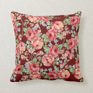 Scattered Roses Throw Pillow on Burgundy Field