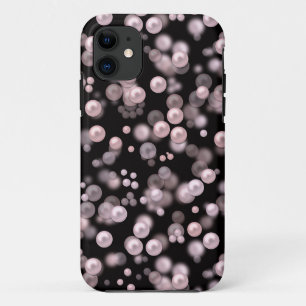 Scatterings of pink and white pearls on black velv iPhone 11 case