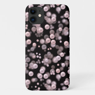 Scatterings of pink and white pearls on black velv iPhone 11 case