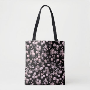 Scatterings of pink and white pearls on black velv tote bag