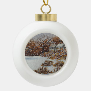 scenic picture of rural cottages in the snow ceramic ball christmas ornament