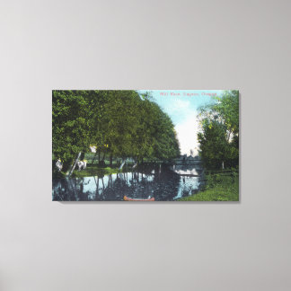Scenic River with Canoe SceneEugene, OR Canvas Print