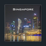 Scenic Singapore Skyline Magnet<br><div class="desc">A scenic cityscape. The singapore skyline at night with many highrise buildings brightly lit with their colourful reflections illuminating the picturesque waterfront along the Singapore river.</div>