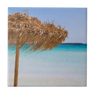 Scenic Tropical Beach with Straw Umbrella Tile