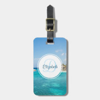 Scenic Tropical Beach with Thatched Huts Photo