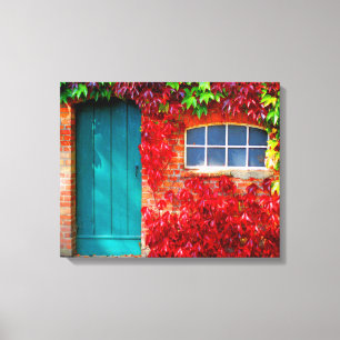 Scenic Turquoise Door with Vivid Autumn Leaves Canvas Print