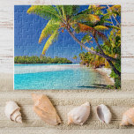 Scenic view of Cook Island Beach | Tropical Jigsaw Puzzle<br><div class="desc">Experience the breathtaking beauty of the Cook Islands with this stunning jigsaw puzzle. The photo captures the essence of these idyllic islands with a picturesque beach surrounded by overgrown coconut trees, turquoise blue waters, and clear blue skies. As you piece together this puzzle, you'll feel like you're transported to the...</div>