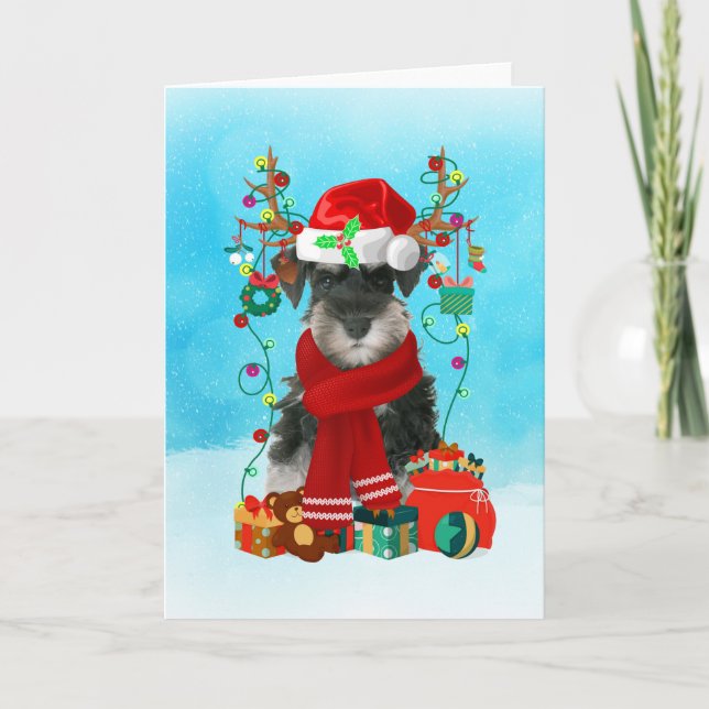 Schnauzer in snow with Christmas gifts Card (Front)
