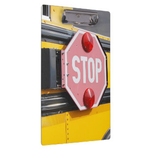 School Bus Stop Sign on Clipboard