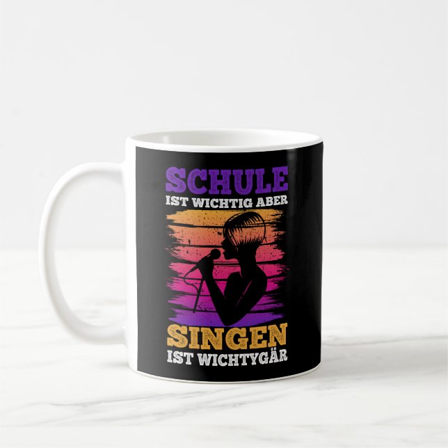 School is important, but singing is more important coffee mug (Left)