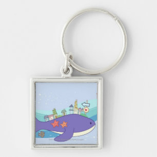 School of fishes swimming in underwater town key ring