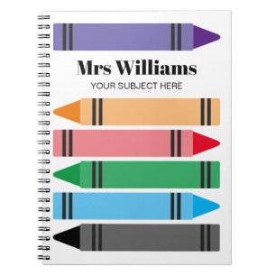 School teacher's notebook with colorful crayons