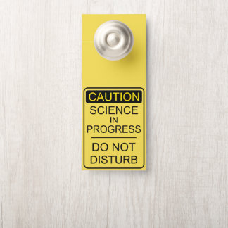 Science in Progress door hanger