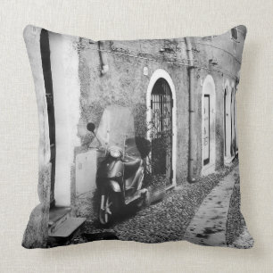 Scooter in a street in Italy in black and white Cushion