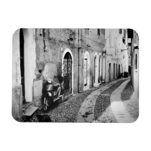 Scooter in a street in Italy in black and white Magnet
