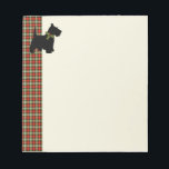 Scottie Dog Scotch Plaid Christmas Notepad<br><div class="desc">Cute black Scottish Terrier Dog with Scot Tartan plaid in red and green.  Scottie wears a collar made of a holly wreath for the Christmas holiday.  Perfect for pet owners and animal lovers. Doggie Christmas fun.</div>