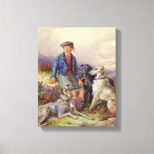 Scottish boy with wolfhounds in a Highland landsca Canvas Print