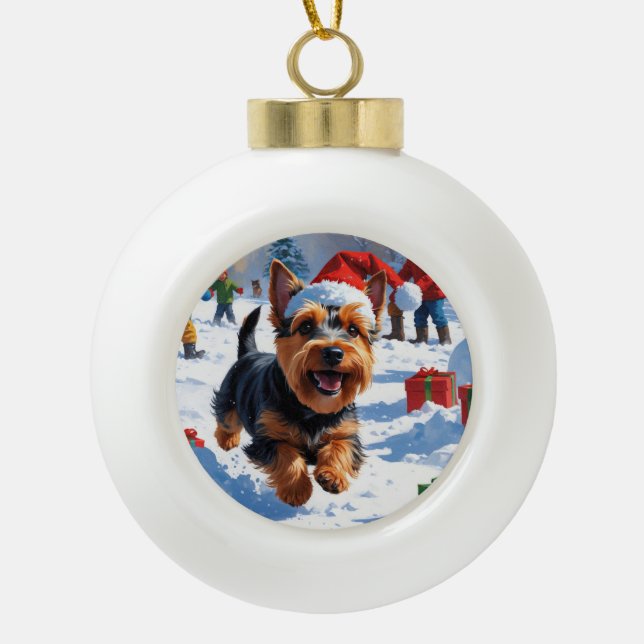 Scottish Terrier Running Snow with Christmas Hat Ceramic Ball Christmas Ornament (Front)