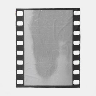 Scratched film strip, vintage placeholder. fleece blanket