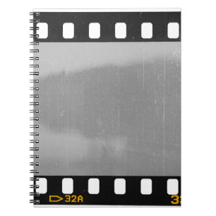 Scratched film strip, vintage placeholder. notebook