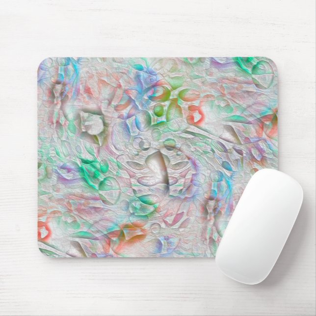 Scratched pixels in coloured texture over off-whit mouse mat (With Mouse)