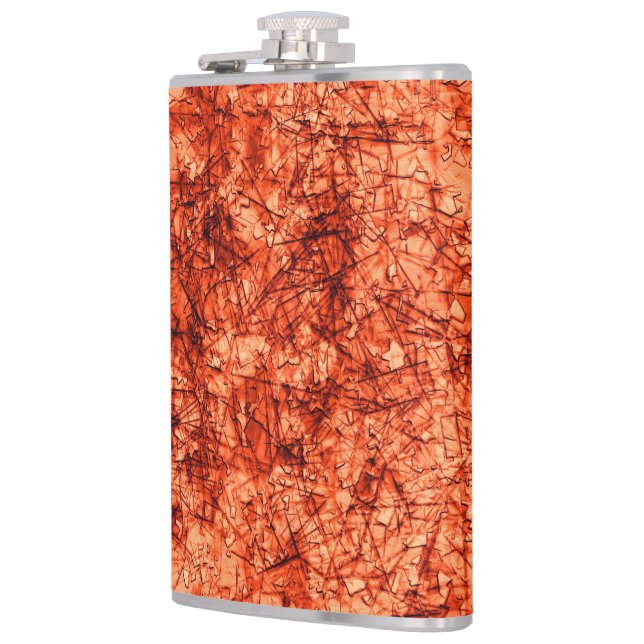 Scratches on a lightly spotted coral background hip flask (Left)